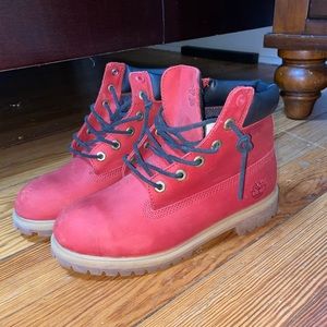 Red and black timberland boots